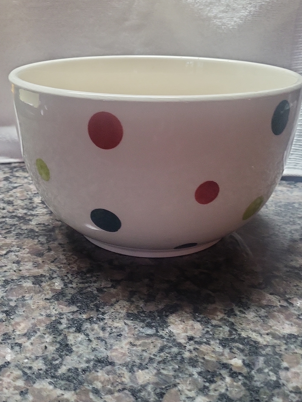 Polka dotted bowl 5 " height & 8" opening cream colored base microwave oven safe